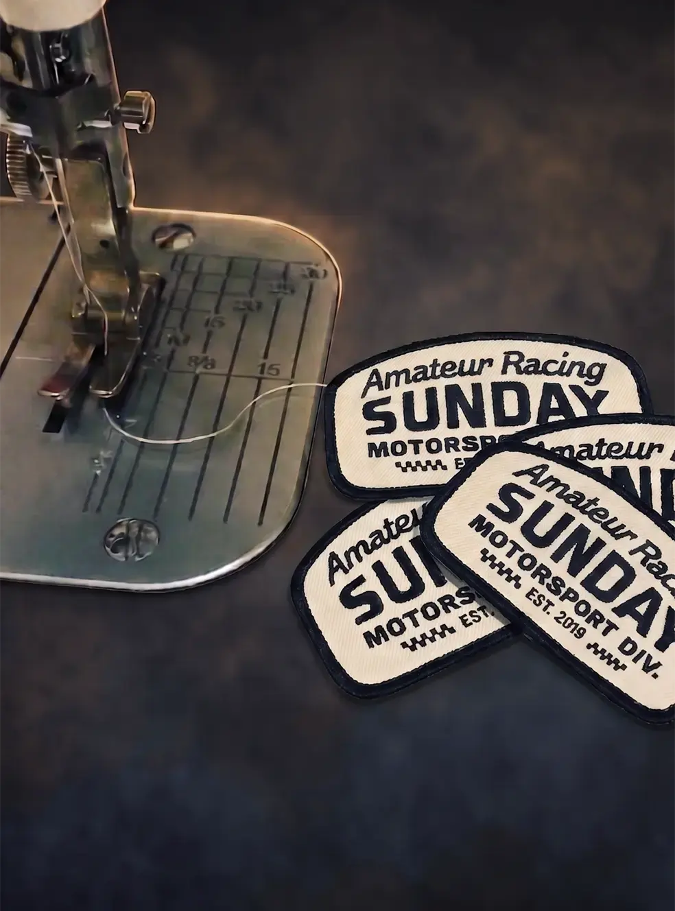 Contract sewing services — patches sewn onto garments by New York Custom Labels