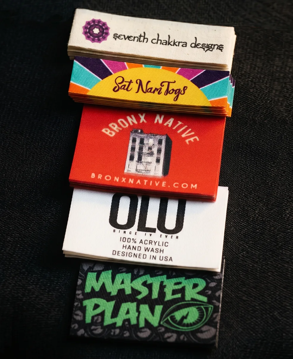 Custom fast clothing labels — full color sublimation printed woven labels