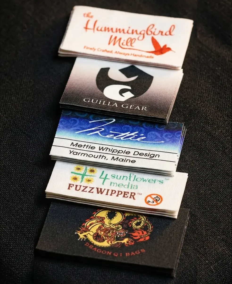 Custom fast clothing labels — full color sublimation printed woven labels